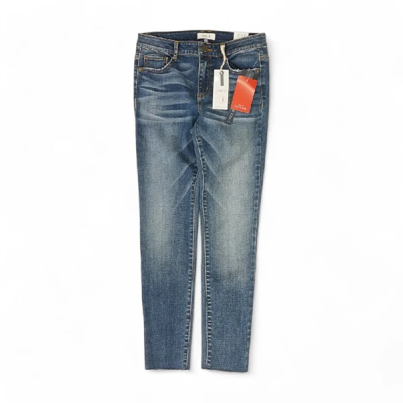 Blue Solid Mid Rise Skinny Leg Jeans