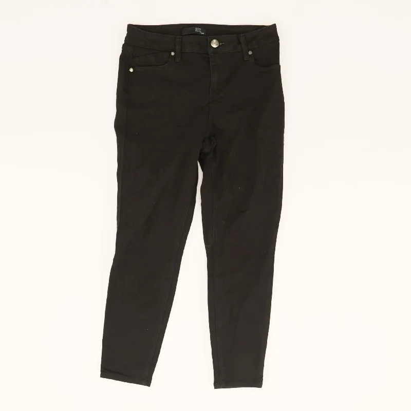 Black Solid Mid Rise Slim Leg Jeans